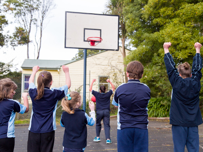 Students playing basketball