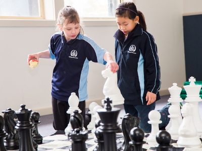 Students playing chess